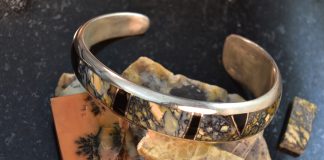 yellow, black, and blue-grey australian dendritic opal bracelet made setting opals without prongs