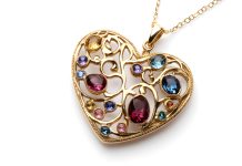 history of birthstones includes necklaces like this heart shaped pendant necklace set with birthstones for family members