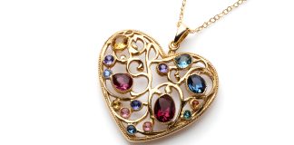 history of birthstones includes necklaces like this heart shaped pendant necklace set with birthstones for family members