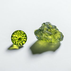 peridot gemstone - faceted and raw specimens