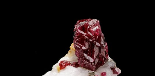 spinel gemstone perched on matrix