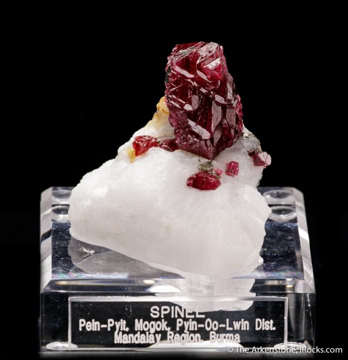 Spinel spinel gemstone perched on matrix