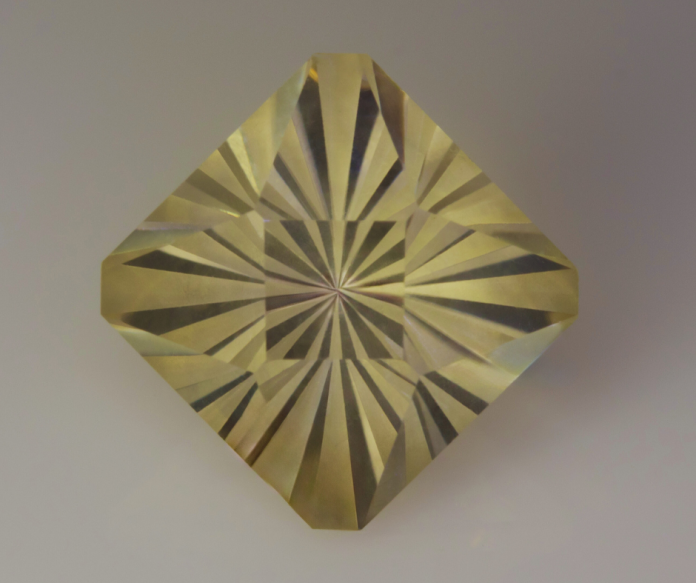 Spellbound Faceting Design Oregon sunstone faceted using spellbound design