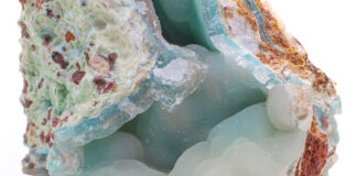 Blue smithsonite mineral on white background.