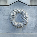 Nineteenth century white bronze zinc headstone with wreath and flowers