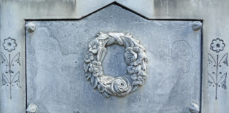 Nineteenth century white bronze zinc headstone with wreath and flowers