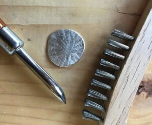 brushing pendant with stainless steel brush