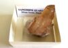 tangerine quartz in a rock collection box