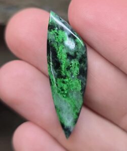 maw sit sit rectangular cabochon with a point at one end