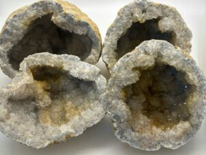 four geodes that have been opened to reveal their interior