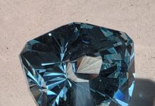 An ULTRA TEC Faceting Machine Journey fininished gemstone crafted using a faceting machine