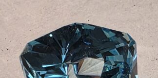 An ULTRA TEC Faceting Machine Journey fininished gemstone crafted using a faceting machine