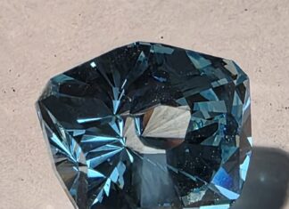 An ULTRA TEC Faceting Machine Journey fininished gemstone crafted using a faceting machine