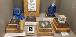 Exhibit case at 2020 TGMS show offers a look at business tips for successfully displaying your lapidary skills.