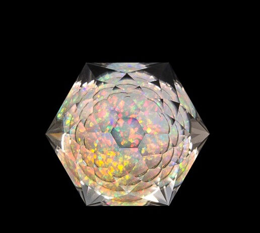 Faceted quartz galaxy gem with a "star burst" crown.