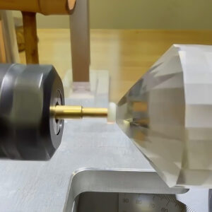 Using the ULTRA TEC Fantasy, V5 faceting and Rotator Kit to fit and polish the opal insert into the quartz concave culet.