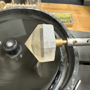 Gem cutting process of undercutting the girdle.